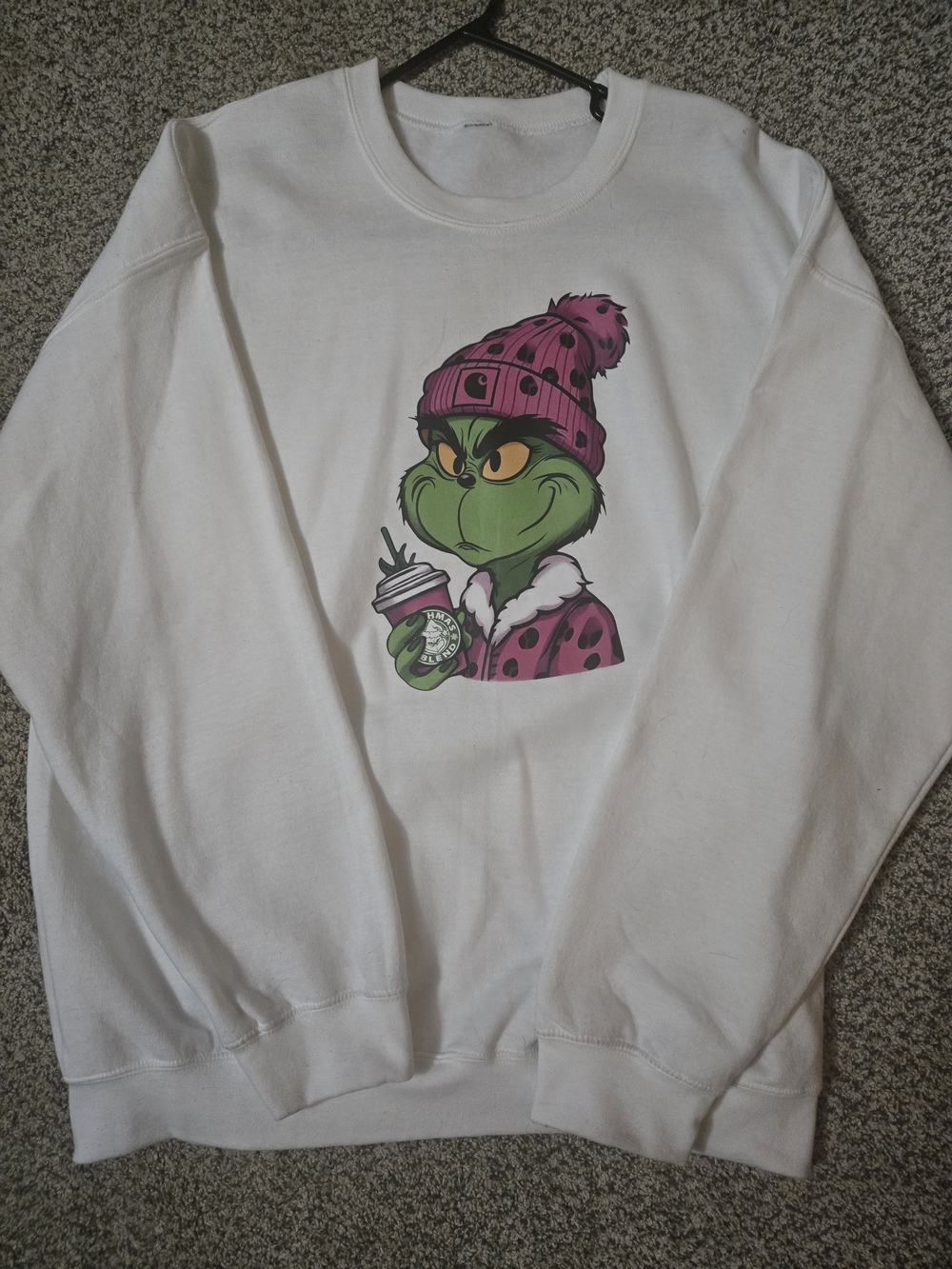 White Sweatshirt with Grinch Graphic and Pink Beanie